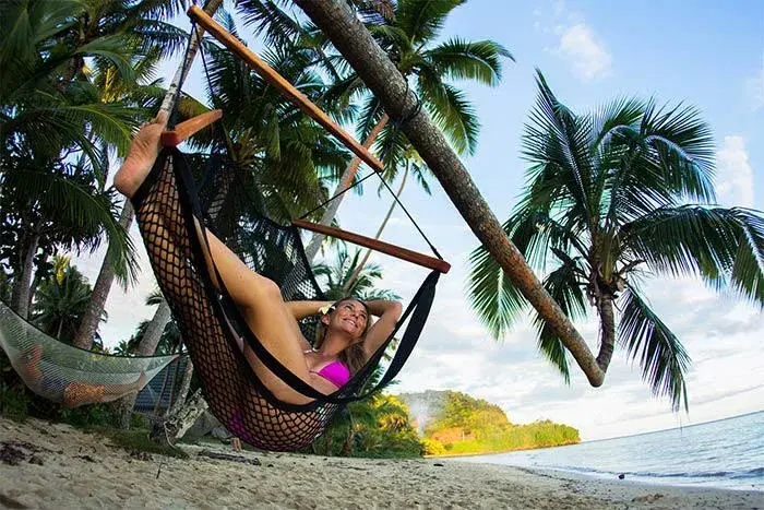 Girl relaxing in hammock